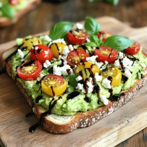 - Ripe avocados - Cherry tomatoes - Fresh basil Fresh produce is key to a great avocado toast. Choose ripe avocados, as they add creaminess. Look for ones that yield slightly when you press them. Cherry tomatoes bring a burst of flavor. Halve them to make them easy to eat. Fresh basil adds a bright, herbaceous note. Use it chopped or torn for the best taste. - Whole grain bread - Olive oil - Balsamic glaze - Lemon juice - Salt and pepper Pantry staples complete this dish. Whole grain bread provides a hearty base. Toast it until it's golden and crisp. Olive oil adds richness, while balsamic glaze offers a hint of sweetness. A splash of lemon juice brightens the avocado. Don’t forget salt and pepper to enhance the flavors. - Feta cheese Feta cheese is a must for this recipe. Its salty, tangy flavor pairs well with the creamy avocado. Crumble it over the toast for the perfect finish. This adds a nice texture contrast and a punch of taste. For the full recipe, check out the instructions. Each ingredient plays an important role in creating a delicious avocado toast that is simple yet delightful. Start with the bread. I use whole grain bread for a hearty base. Toast it until golden brown. This usually takes about 5 minutes in the toaster. If you prefer, you can use a grill pan. Aim for a nice crunch on the outside. This gives your toast the right texture. Next, I focus on the avocados. Choose ripe ones and cut them in half. Remove the pit carefully and scoop the flesh into a bowl. Add lemon juice, salt, and pepper for flavor. Then, mash the avocado with a fork. You can choose how smooth or chunky you want it. I like mine with a bit of texture. Now, it’s time for the tomatoes. Take your halved cherry tomatoes and place them in a bowl. Add olive oil and chopped basil. Mix them well until the tomatoes are coated evenly. This step ensures every bite is full of flavor. Once the toast is ready, spread the mashed avocado generously on each slice. Then, sprinkle crumbled feta cheese on top. This adds a creamy, salty kick. Next, spoon the tomato mixture over the feta. Finish by drizzling balsamic glaze over the toast. This adds a sweet touch that ties everything together. For the complete recipe, refer to the [Full Recipe]. To make your avocado smooth, mash it well with a fork. Add lemon juice, salt, and pepper to enhance the flavor. If you like it chunky, simply mash it less. Leave some pieces intact for a nice bite. For crispy toast, choose whole grain bread. Toast it until golden brown, about five minutes. Use a toaster or grill pan for best results. If you want extra crunch, brush the bread lightly with olive oil before toasting. To take the taste to the next level, think about extra seasonings. A pinch of garlic powder or a sprinkle of chili flakes can add a nice kick. You can also mix in some chopped herbs, like cilantro or parsley. Try adding spices like smoked paprika or cumin. They will bring warmth and depth to your avocado toast. Just sprinkle a little on top after you spread the avocado. Make your toast look great with some creative serving ideas. Use a wooden cutting board or a colorful platter to display your toasts. Arrange them neatly in a row for a clean look. Garnish with whole basil leaves for a pop of green. Drizzle extra balsamic glaze on top for a sweet touch. This not only adds flavor but also makes the dish more inviting. For the full recipe, you can refer to the section above on Avocado Delight Toast with Feta & Cherry Tomatoes. {{image_2}} You can switch up the bread type for your avocado toast. Use sourdough, rye, or even gluten-free bread. Each type brings its own flavor and texture. For the feta cheese, try goat cheese or even a vegan option. These swaps can change the taste while keeping it delightful. Feel free to add other vegetables to your toast. Sliced radishes, cucumbers, or spinach can brighten the dish. You can also mix flavors. Try adding a spicy pepper or some olives. These additions create a new taste experience with every bite. Want to make it vegan-friendly? Simply replace feta with tofu or a nut-based cheese. It still tastes great! If you need gluten-free options, use gluten-free bread. You can enjoy this recipe without worry, keeping it tasty and suitable for everyone. To keep your avocado toast fresh, store it in an airtight container. Place slices of toast in a single layer. If you have leftover toppings, separate them in another container. This keeps the toast from getting soggy. For mashed avocado, add a bit of lemon juice on top. This helps slow down browning. Cover the bowl tightly with plastic wrap or a lid. When reheating your toast, avoid the microwave if you can. It makes the bread chewy. Instead, use a toaster or an oven to warm it up. Preheat your oven to 350°F (175°C). Place the toast on a baking sheet for about 5 minutes. This keeps it crispy and fresh. Can you freeze avocado toast? Yes, but it’s best to freeze the components separately. Toast the bread first, then let it cool. Wrap each slice in plastic wrap and place them in a freezer bag. For avocado, mash it and store it in a sealed container. To defrost, place the toast in the fridge overnight. Thaw the avocado on the counter for a few hours. After thawing, mix it with a bit of lemon juice to revive its flavor. Enjoy your avocado delight toast fresh! For the full recipe, refer back to the beginning. For avocado toast, use ripe avocados. They should feel slightly soft when you press them gently. If they are too hard, wait a few days for them to ripen. A ripe avocado will have dark skin and may yield to light pressure. If you have overripe avocados, they may be brown inside. They won’t taste good in your dish. If you want a cheese swap, try goat cheese or ricotta. Both have a creamy texture and delicious taste. For a non-dairy option, use a plant-based feta made from nuts or tofu. These options will change the flavor slightly, but they can still make your toast tasty. Avocado toast is best fresh, but you can store it for a short time. If you have leftovers, keep them in the fridge for up to one day. The bread may get soggy, and the avocado will brown. To prevent browning, sprinkle lemon juice on the avocado before storing. You can prepare some parts ahead of time. Toast the bread just before serving for the best crunch. You can mash the avocado and mix the tomatoes in advance. Just add a bit of lemon juice to the avocado to keep it fresh. Assemble the toast right before eating for the best flavor. Pair your avocado toast with fresh fruit or a simple salad for a light meal. A glass of freshly squeezed juice or a cup of coffee works well, too. If you want a heartier dish, add poached or fried eggs on top. These sides will enhance your meal and add variety. In this blog post, we explored making delicious avocado toast. We covered fresh produce like ripe avocados and cherry tomatoes. You learned to prepare and mash avocado and mix a tasty tomato topping. We also shared tips for the perfect texture and flavor. Don't forget about variations, dietary swaps, and smart storage hacks. The right avocado and cheese can elevate your dish. Now, go create your perfect avocado toast and enjoy every bite.