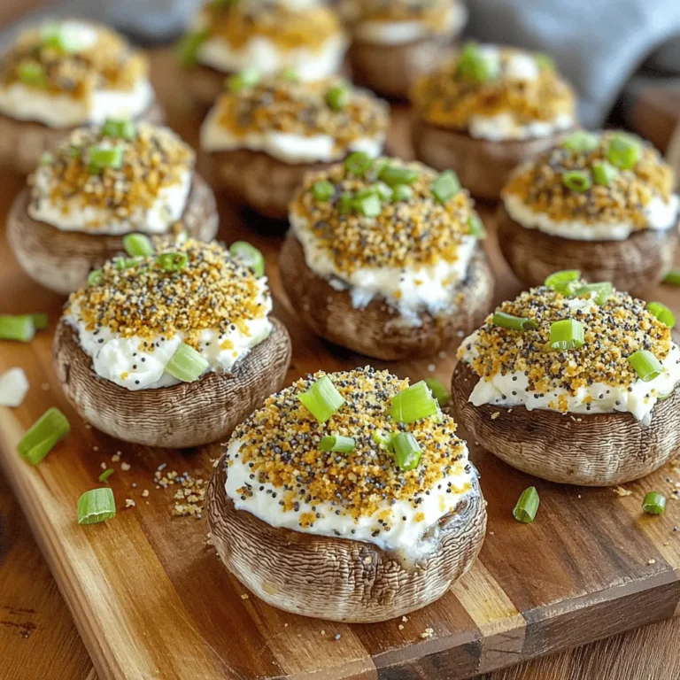 - 12 large cremini or button mushrooms - 4 oz cream cheese, softened - 1/4 cup shredded mozzarella cheese - 1/4 cup finely chopped green onions - 1/4 cup plain breadcrumbs - 2 tablespoons everything bagel seasoning - 1 tablespoon olive oil - Salt and pepper to taste You can add extras to make these mushrooms unique. Try: - Crumbled bacon for a savory twist. - Chopped spinach for more greens. - Different cheeses, like feta or cheddar. When picking mushrooms, look for these signs: - They should feel firm and plump. - Check for smooth, unblemished caps. - Avoid mushrooms that look slimy or shriveled. - Smell them; fresh mushrooms have a light, earthy scent. With these ingredients and tips, you’re set to make delightful Air Fryer Everything Bagel Stuffed Mushrooms! Start by warming your air fryer to 350°F (175°C). Next, grab your large cremini or button mushrooms. Gently clean each mushroom by wiping it with a damp cloth. This step is key to keeping them fresh. After cleaning, remove the stems from the caps. Finely chop these stems and set them aside for later. This will add great flavor to your filling. In a mixing bowl, combine the chopped mushroom stems, softened cream cheese, shredded mozzarella cheese, and finely chopped green onions. Add in the plain breadcrumbs and two tablespoons of everything bagel seasoning. Don’t forget a pinch of salt and pepper to taste. Mix everything well until it forms a smooth filling. This mixture is what makes your stuffed mushrooms so tasty. Now, it’s time to fill the mushrooms. Use a spoon to generously fill each mushroom cap with your creamy mixture. Once filled, drizzle the stuffed mushrooms with olive oil. Sprinkle the remaining everything bagel seasoning on top for extra flavor. Place the stuffed mushrooms in a single layer in the air fryer basket. Make sure they don’t touch each other. Cook them for 10 to 12 minutes. They should turn golden brown and the filling should be bubbly. After cooking, carefully take them out and let them cool for a few minutes. Enjoy these delicious snacks warm! To make sure your stuffed mushrooms cook evenly, follow these steps: - Preheat your air fryer to 350°F (175°C). - Clean mushrooms gently to avoid bruising. - Arrange mushrooms in a single layer. Do not stack them. - Leave space around each mushroom for air to flow. This helps them cook properly and get that nice golden color. Flavor is key in any dish. Here’s how to boost it in your stuffed mushrooms: - Use fresh ingredients. Fresh mushrooms and green onions add more taste. - Mix your filling well. This ensures every bite is full of flavor. - Don’t skip the everything bagel seasoning. It adds a unique taste that makes these special. - Drizzle a bit of olive oil on top before cooking. It helps with browning and flavor. Each of these tips will help create a delicious bite. These stuffed mushrooms shine as an appetizer or snack. Here are some ideas to serve them: - Plate them on a rustic wooden board for a nice look. - Garnish with extra green onions for color and freshness. - Serve warm with dipping sauces like ranch or marinara. - Pair them with a light salad for a full meal. These ideas will make your stuffed mushrooms even more enjoyable! {{image_2}} You can easily make these stuffed mushrooms vegetarian. Instead of cream cheese, try using a plant-based cream cheese. It adds the same creamy texture and taste without the dairy. You can also replace the mozzarella with vegan cheese. Look for options that melt well. This way, you keep the dish rich and tasty while making it plant-friendly. For those who are gluten-free, swap out the plain breadcrumbs. Use gluten-free breadcrumbs or almond flour instead. Both options will give you a nice crunch. Just make sure to check that your everything bagel seasoning is gluten-free too. This keeps the recipe safe for everyone while still being delicious. Experimenting with cheese can bring new flavors to your stuffed mushrooms. You can use goat cheese for a tangy kick. Feta cheese also works well, giving a salty and creamy bite. If you love a stronger flavor, try blue cheese. Each cheese choice offers a unique taste, so feel free to mix it up! After enjoying your Air Fryer Everything Bagel Stuffed Mushrooms, let them cool. Place any leftovers in an airtight container. Store them in the fridge for up to three days. This keeps them fresh and tasty for your next snack. If you want to save some for later, freezing works well. First, let the stuffed mushrooms cool completely. Then, arrange them in a single layer on a baking sheet. Freeze them for about two hours until firm. Once frozen, transfer them to a freezer-safe bag or container. You can keep them in the freezer for up to three months. To enjoy your stuffed mushrooms again, you have a few options. For the best results, reheat them in the air fryer. Set it to 350°F (175°C) and cook for about 5-7 minutes. This method keeps them crispy. You can also use a microwave, but they may lose some texture. Heat them for about 30-60 seconds, checking often so they don’t get too hot. Enjoy your delicious mushrooms! Yes, you can use other mushrooms. Try portobello, shiitake, or oyster mushrooms. Each type adds its own flavor. Portobello has a meaty taste, while shiitake offers a woodsy note. Oyster mushrooms have a soft texture and mild flavor. Just make sure the mushrooms are large enough to hold the filling. To cook these in the oven, preheat it to 375°F (190°C). Prepare the mushrooms as you would for the air fryer. Fill them with the cream cheese mix. Place them on a baking sheet lined with parchment. Bake for about 15-20 minutes until golden and bubbly. Keep an eye on them to avoid burning. Great dipping sauces include ranch, garlic aioli, or marinara. Ranch adds a cool, creamy touch. Garlic aioli gives a strong flavor punch. Marinara brings a nice, tangy contrast. You can also try a spicy sriracha mayo for a kick. Feel free to experiment with your favorite sauces! In this post, we explored the ingredients, preparation, and cooking methods for stuffed mushrooms. We learned how to choose fresh mushrooms and customize your filling. Tips for even cooking and flavor helped elevate your dish. We also discussed variations for dietary needs and proper storage for leftovers. Stuffed mushrooms can impress at any meal. With these easy steps, you can make your version shine. Enjoy experimenting with flavors and sharing with friends!