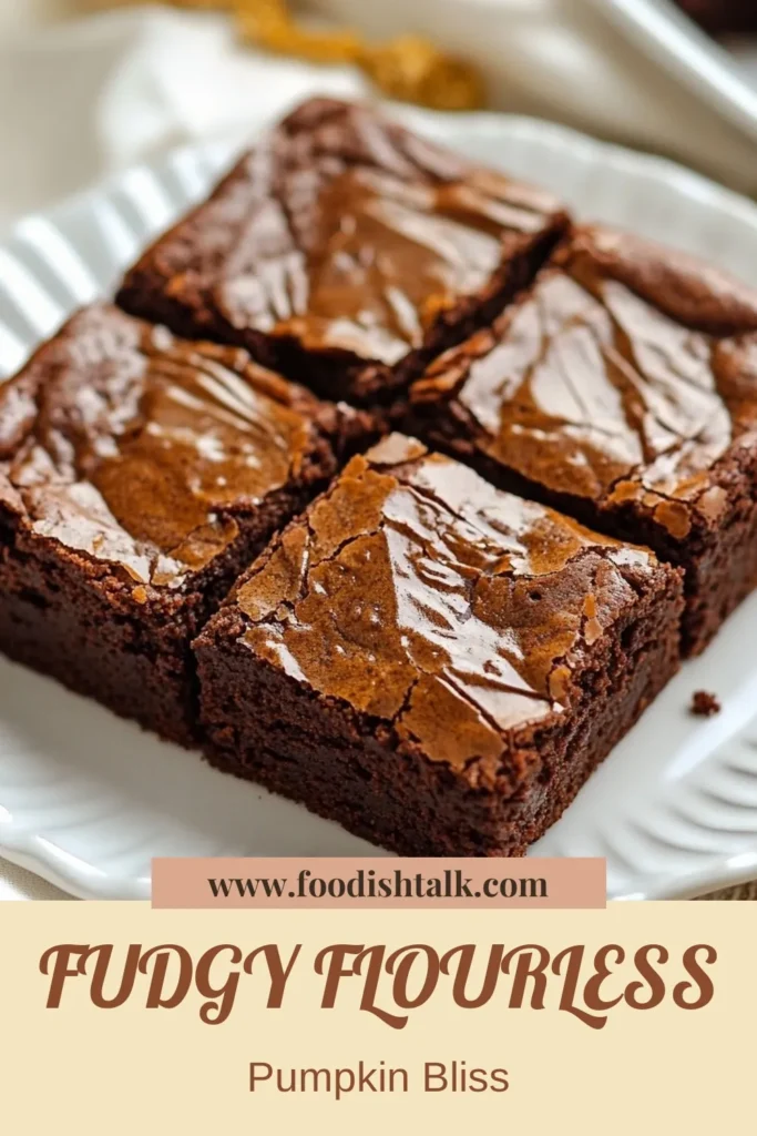 Indulge in these delicious Flourless Pumpkin Brownies, the ultimate healthy pumpkin dessert! This gluten-free brownies recipe is easy to make with pumpkin puree and creamy almond butter for a guilt-free treat. Perfect for fall, these almond butter brownies are rich, fudgy, and infused with warm spices. Try this easy pumpkin recipe today and satisfy your sweet tooth! Save this recipe for a healthier dessert option. #FlourlessPumpkinBrownies #HealthyPumpkinDessert #GlutenFreeBrowniesRecipe #EasyPumpkinRecipes