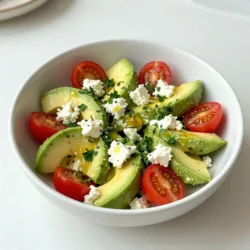 - 1 can (15 oz) chickpeas, drained and rinsed - 1 ripe avocado, diced - 1/2 cup crumbled feta cheese Chickpeas are the star of this dish. They bring protein and fiber to the table. I always use canned chickpeas for ease. Just drain and rinse them before adding. Avocado adds a creamy texture. When choosing avocados, look for ones that yield slightly when you press them. This means they are ripe and ready to use. Feta cheese gives a salty bite. I prefer crumbled feta for its texture. It mixes well with the other ingredients and enhances the flavor. - 1 cup cherry tomatoes, halved - 1 cucumber, diced - 1/2 red onion, finely chopped Cherry tomatoes add sweetness and color. Halve them for easy mixing. They look great in the salad and taste fresh. Cucumber provides a nice crunch. When dicing, make sure the pieces are similar in size. This helps create a balanced bite. Red onion adds a sharp flavor. Finely chopping it makes it easier to mix. You can soak it in cold water to mellow its taste, if desired. - 2 tablespoons olive oil - 1 tablespoon lemon juice - Salt and pepper to taste Olive oil serves as the base for the dressing. It adds richness and ties the salad together. Always use good quality oil for the best flavor. Lemon juice gives brightness. It balances the richness of the avocado and feta. Freshly squeezed lemon juice is best for taste. Seasoning with salt and pepper enhances all the flavors. Start with a pinch of each and adjust to your liking. This gives the salad a lovely finish. {{ingredient_image_1}} - Draining and rinsing chickpeas Start by opening a can of chickpeas. Pour them into a colander to drain. Rinse them well under cold water. This step helps remove the canning liquid and makes them taste better. Set them aside to dry. - Dicing avocado and cucumber Take a ripe avocado and cut it in half. Remove the pit and scoop the flesh out with a spoon. Dice it into small pieces. Next, wash the cucumber and cut it into small cubes. This adds crunch and freshness to the salad. - Chopping red onion and parsley Peel the red onion and chop it finely. This will give your salad a nice sharpness. Now, take fresh parsley, wash it, and chop it coarsely. This herb adds a bright flavor to the dish. - Mixing base ingredients in a bowl In a large mixing bowl, add the drained chickpeas, diced avocado, halved cherry tomatoes, diced cucumber, and finely chopped red onion. Gently mix these ingredients together. You want them to combine without smashing the avocado. - Gently folding in feta cheese Now, take the crumbled feta cheese and sprinkle it over the mixture. Carefully fold it in with a spatula. This keeps the cheese intact and enhances the salad's flavor. - Whisking olive oil and lemon juice In a small bowl, pour in two tablespoons of olive oil. Add one tablespoon of fresh lemon juice. Use a whisk to mix them together until they blend well. This dressing adds a zesty touch. - Pouring dressing over salad and tossing Drizzle the dressing over the salad mixture. Use a spoon to toss everything together gently. Make sure the dressing coats all the ingredients evenly. If you have time, let it sit in the fridge for about 15 minutes. This allows the flavors to meld beautifully. To make your Chickpea Feta Avocado Salad pop, use fresh herbs. I love adding parsley, but basil or mint work too. A pinch of garlic powder or a dash of chili flakes can also boost the taste. Chilling the salad is key. Let it rest in the fridge for about 15 minutes. This helps flavors mix and taste better. Prevent browning by using lemon juice on your diced avocado. Just a squeeze before mixing works wonders. To dice the avocado, cut it in half, remove the pit, and scoop out the flesh with a spoon. Then, slice it into cubes right in the skin. This method keeps it neat and easy. For a lovely presentation, serve the salad in individual bowls. You can also use a large platter for gatherings. Top each serving with extra parsley and a sprinkle of feta. This adds color and makes it look fresh. Pair this salad with grilled chicken or crusty bread. It’s a great side dish for any meal! Pro Tips Use Fresh Ingredients: For the best flavor, opt for fresh, ripe tomatoes and avocados. They will enhance the overall taste of the salad. Chill Before Serving: Letting the salad rest in the refrigerator for 15 minutes allows the flavors to meld together beautifully. Adjust Seasoning: Taste the salad before serving and adjust the salt and pepper to your preference for the perfect balance. Experiment with Add-Ins: Feel free to add other ingredients like bell peppers, olives, or even a sprinkle of toasted nuts for added texture and flavor. {{image_2}} You can change the cheese in this salad. Goat cheese is a great alternative. It adds a creamy texture and tangy taste. If you want a vegan option, try using crumbled tofu or a nut-based feta. These options keep the salad fresh and flavorful without dairy. Want to make this salad heartier? Add grilled chicken or shrimp for protein. They pair well with the chickpeas and veggies. You can also add more vegetables like bell peppers or radishes. This makes the salad even more colorful and crunchy. Change the salad based on what’s in season. In the summer, add fresh corn or zucchini. In the fall, try roasted sweet potatoes or pumpkin. Each season brings new flavors, making the salad fun and interesting. Adjusting the flavors keeps your meals fresh and exciting. To keep your Chickpea Feta Avocado Salad fresh, store it in the fridge. Use an airtight container to seal in flavor and moisture. Glass or plastic containers work well. Make sure to keep the salad covered to prevent it from drying out. If you want to save the salad for later, freezing is an option. However, the avocado may change texture. Consider freezing the chickpeas and dressing separately. To refresh the salad after thawing, add fresh avocado and a splash of lemon juice. This brightens the flavors and helps restore freshness. In the fridge, this salad stays fresh for 2 to 3 days. Check for signs of spoilage, like an off smell or dark, mushy avocado. If you see those signs, it’s best to discard the salad. Keeping an eye on freshness helps ensure you enjoy every bite! Chickpea Feta Avocado Salad lasts about 2 days in the fridge. After that, the avocado may brown and affect the taste. To keep it fresh, store it in an airtight container. Yes, you can make the salad ahead of time. However, wait to add the avocado until just before serving. This keeps it from browning and losing its texture. Absolutely! This salad is great for meal prep. You can store the salad in portions. Just keep the avocado separate until you are ready to eat. This salad is packed with nutrients. Chickpeas provide protein and fiber. Avocados add healthy fats and vitamins. Feta cheese offers calcium, while veggies boost vitamins and minerals. Yes, you can use canned chickpeas. They are convenient and save time. Just drain and rinse them before adding to your salad. This gives you that same great flavor and texture. This post covered the key aspects of making a Chickpea Feta Avocado Salad. I highlighted the main ingredients, accompaniments, and dressing components. We went through simple steps for preparation and combining ingredients. I shared tips to enhance flavor and offered variations to suit your taste. Lastly, we discussed how to store the salad properly. Incorporating this salad into your meals adds freshness and nutrition. Feel free to experiment with flavors and enjoy this delightful dish!